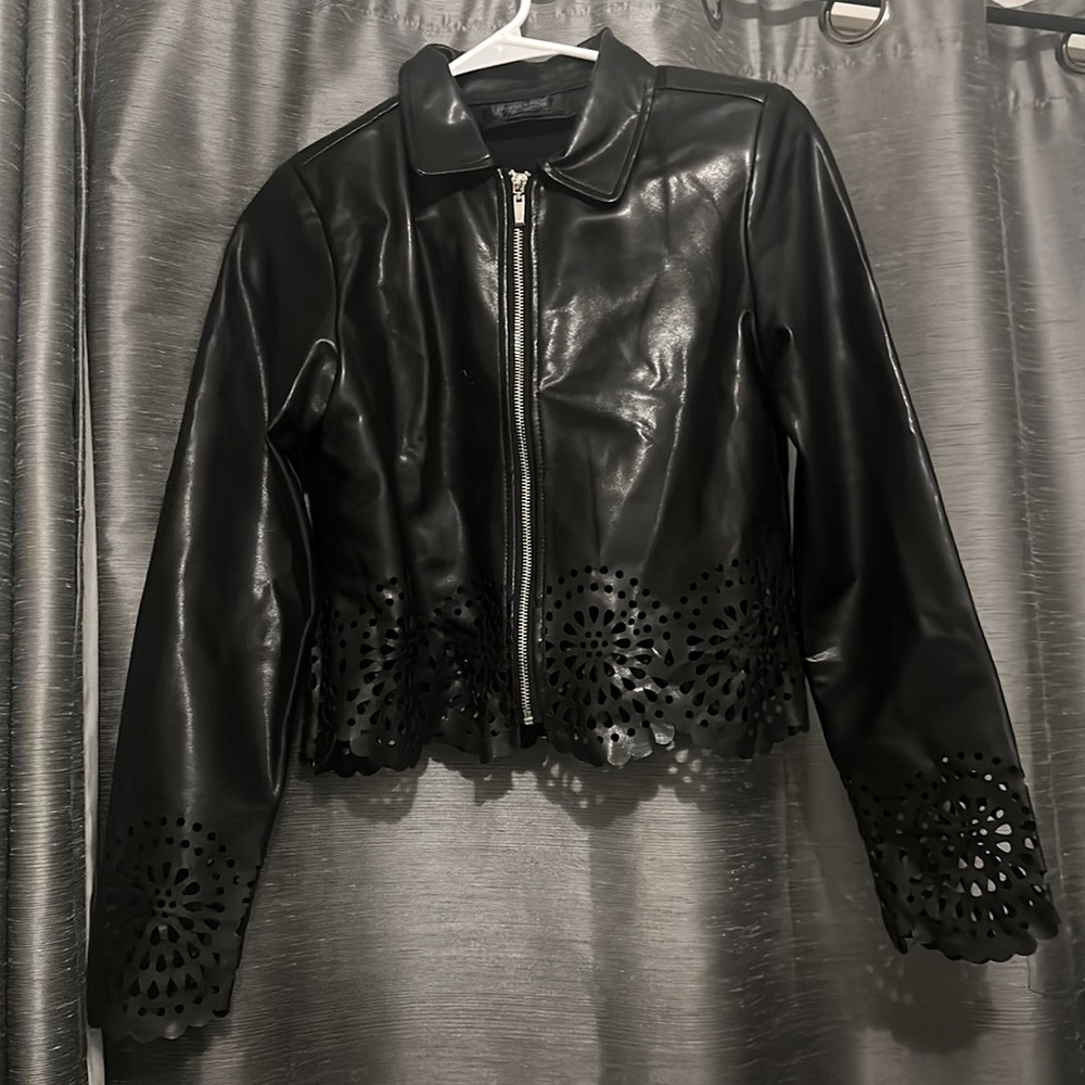 New black faux leather jacket from Pakistan. Brand: Breakout outerwear